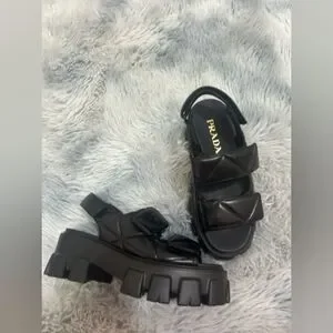 25SS【PRADA】Monolith Nappa Sandals ★送料関税込★ Prada Monolith Nappa Leather Sandals | Saks Fifth Avenue